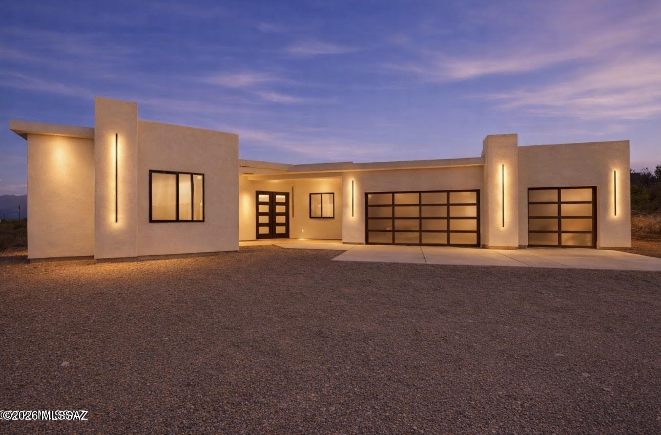 1786 Peralta Court Rio Rico, AZ 85648 - Photo 1 of 50 a view of a big room with windows and cabinet