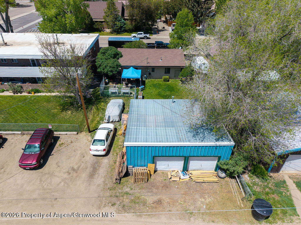 625 Russell Street Craig, CO 81625 - Photo 3 of 35 an aerial view of a house with garden space and street view