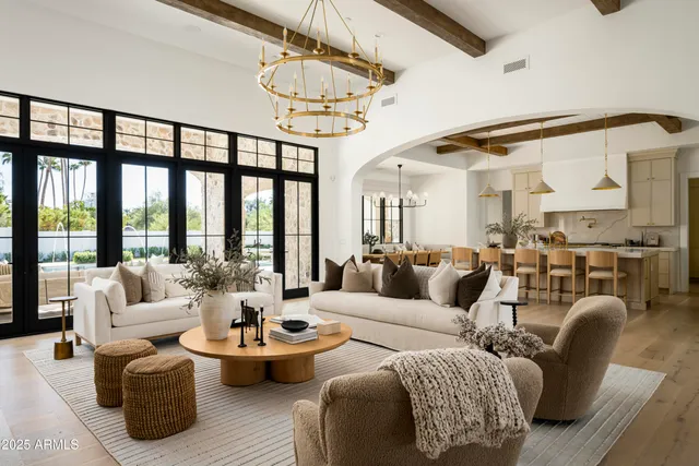 a kitchen with sink a stove and cabinets