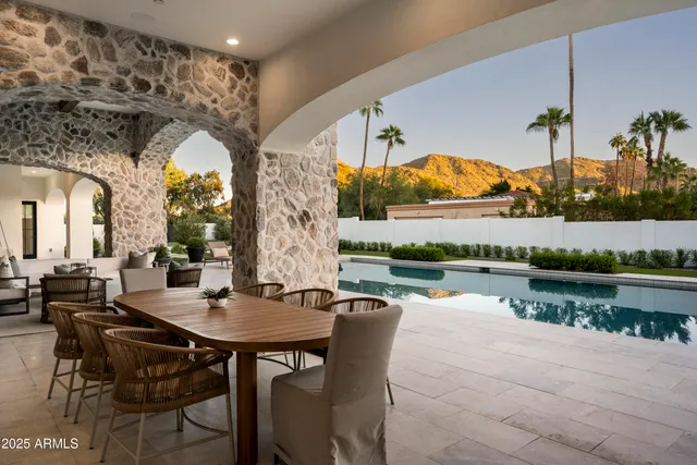 an aerial view of a house with a garden
