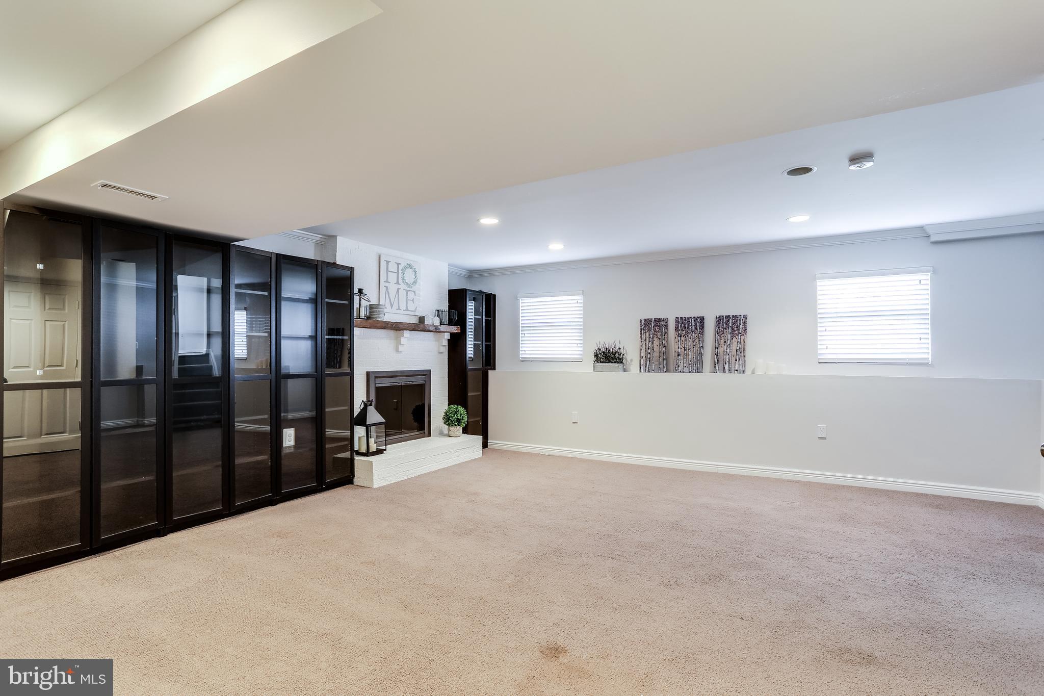 7843 Metacomet Road Hanover, MD 21076 - Photo 20 of 33 Family room with built-ins.