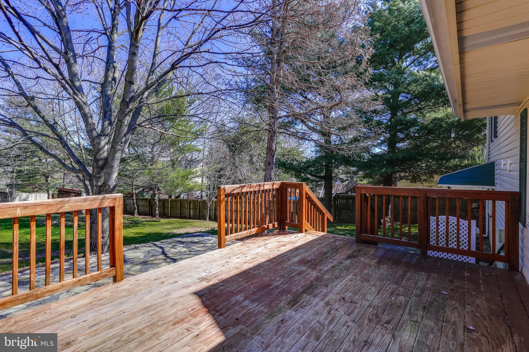 7843 Metacomet Road Hanover, MD 21076 - Photo 27 of 33 Large deck overlooking spacious yard.