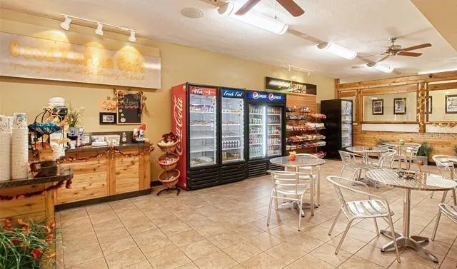 a view of a swimming pool with a couches in a patio