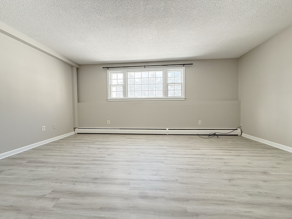 5 Meisner Circle, Unit 25 Salem, NH 03079 - Photo 6 of 6 wooden floor in a room