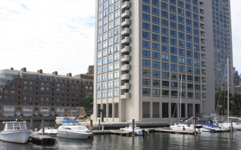 85 East India Row, Unit 36G Boston, MA 02110 - Photo 26 of 29 a building with water view in front of it
