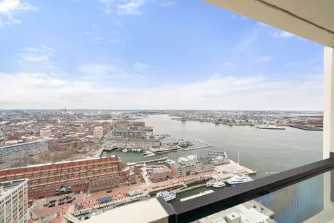 a view of a lake with a city view