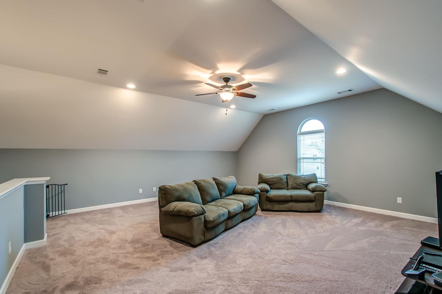 239 Abbey Road Lebanon, TN 37090 - Photo 21 of 25 a living room with furniture and a ceiling fan
