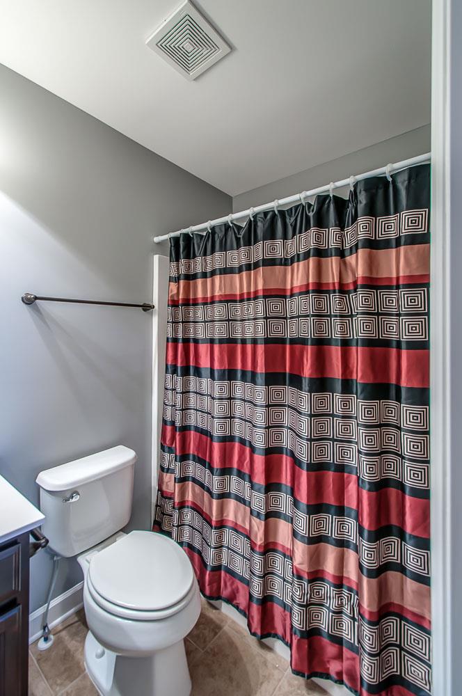 239 Abbey Road Lebanon, TN 37090 - Photo 23 of 25 a bathroom with a shower curtain