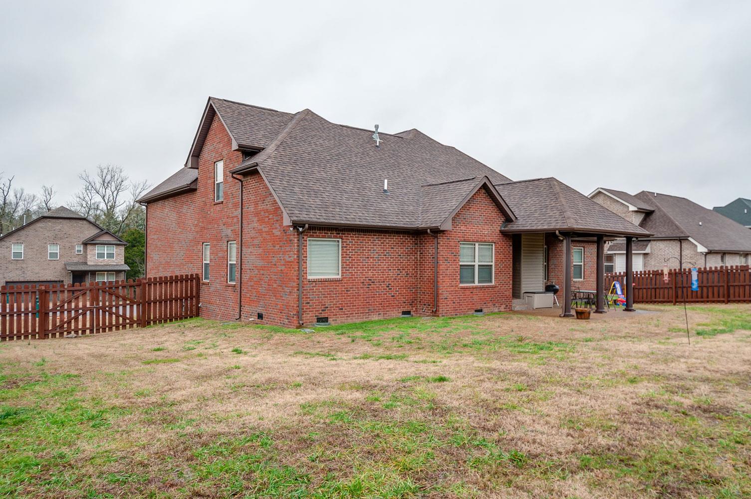 239 Abbey Road Lebanon, TN 37090 - Photo 25 of 25 a front view of a house with garden