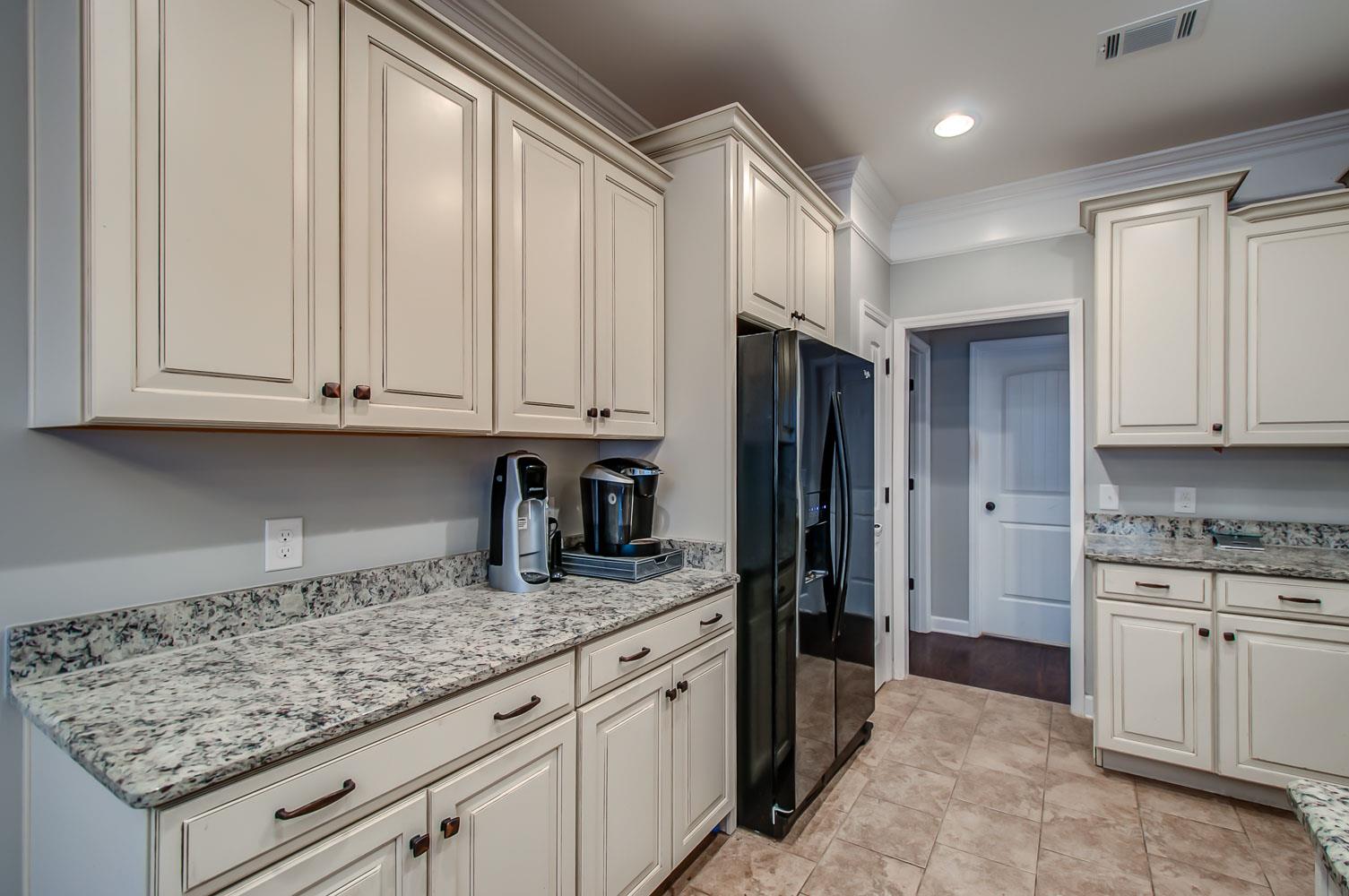 239 Abbey Road Lebanon, TN 37090 - Photo 8 of 25 a kitchen with granite countertop a sink stainless steel appliances and cabinets
