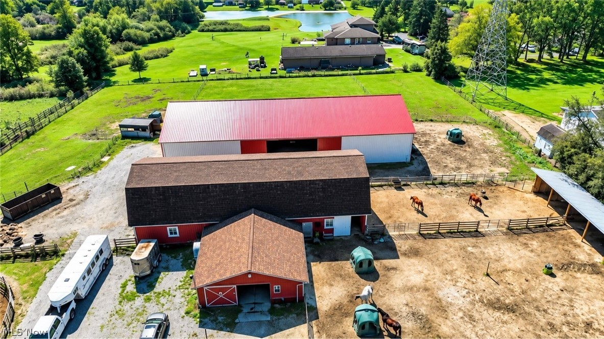 18 Manning Road Mogadore, OH 44260 - Photo 15 of 47 Expansive property featuring multiple barns, fenced animal enclosures, and substantial acreage