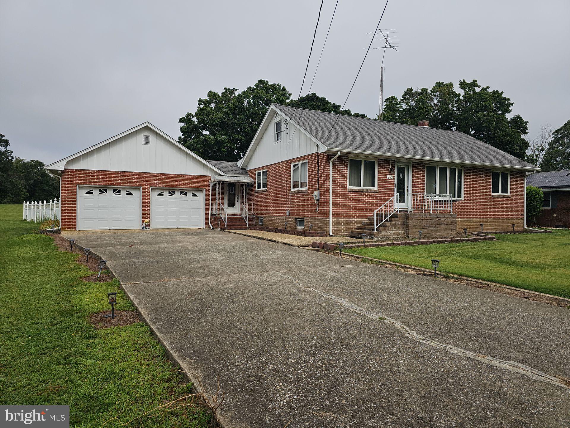 282 Woodruff Road Bridgeton, NJ 08302 - Photo 2 of 19 a house view with a garden