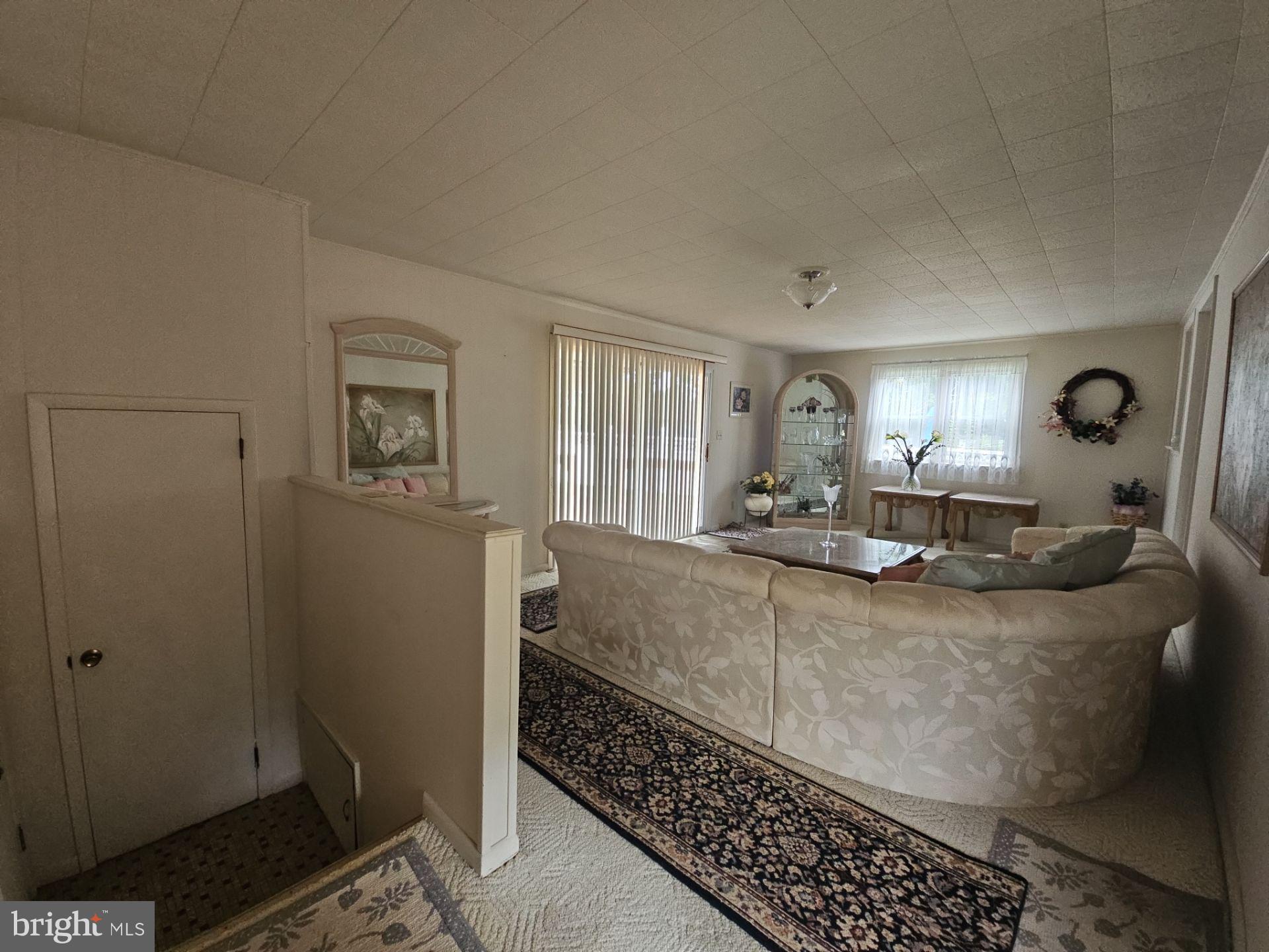 282 Woodruff Road Bridgeton, NJ 08302 - Photo 8 of 19 a living room with furniture