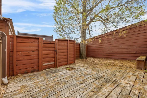 a view of a backyard of the house