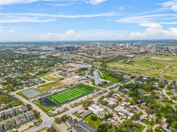 aerial view of residential houses with outdoor space