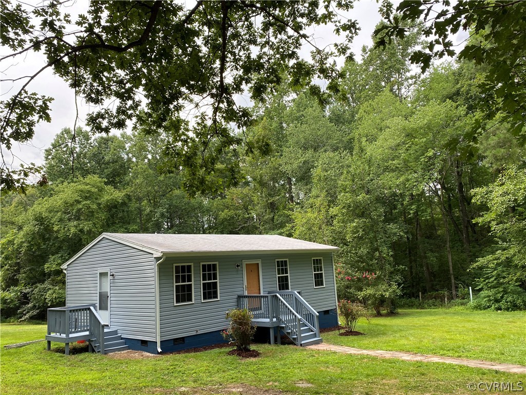 3524 Forest Grove Road Sandy Hook, VA 23153 - Photo 16 of 18 a view of a house with a yard