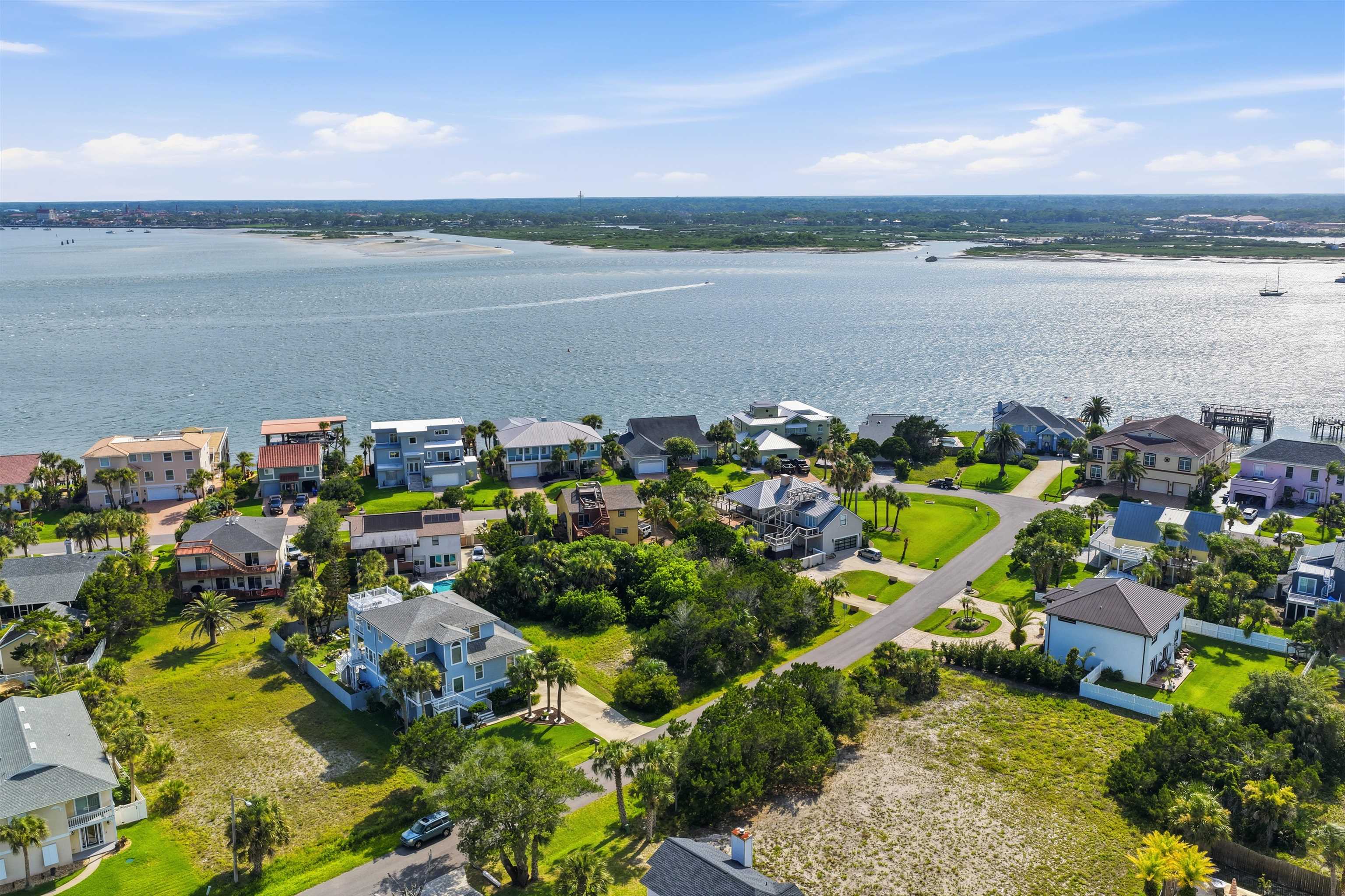 203 Sea Turtle Way St. Augustine, FL 32084 - Photo 15 of 22 a aerial view of a houses with a lake view