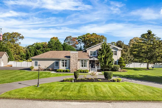 a view of a house with a big yard