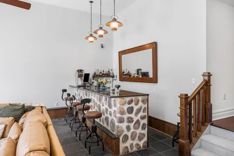 a view of a dining room with furniture