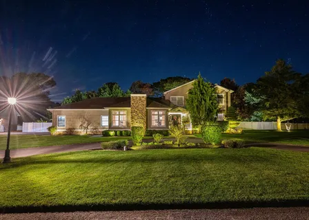 swimming pool view with a seating space