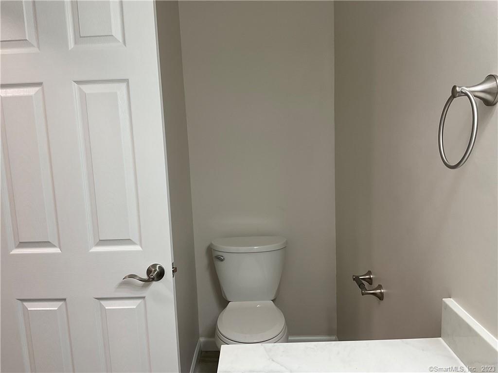 1271 Washington Street, Unit 5 Middletown, CT 06457 - Photo 6 of 19 a bathroom with a toilet and a sink