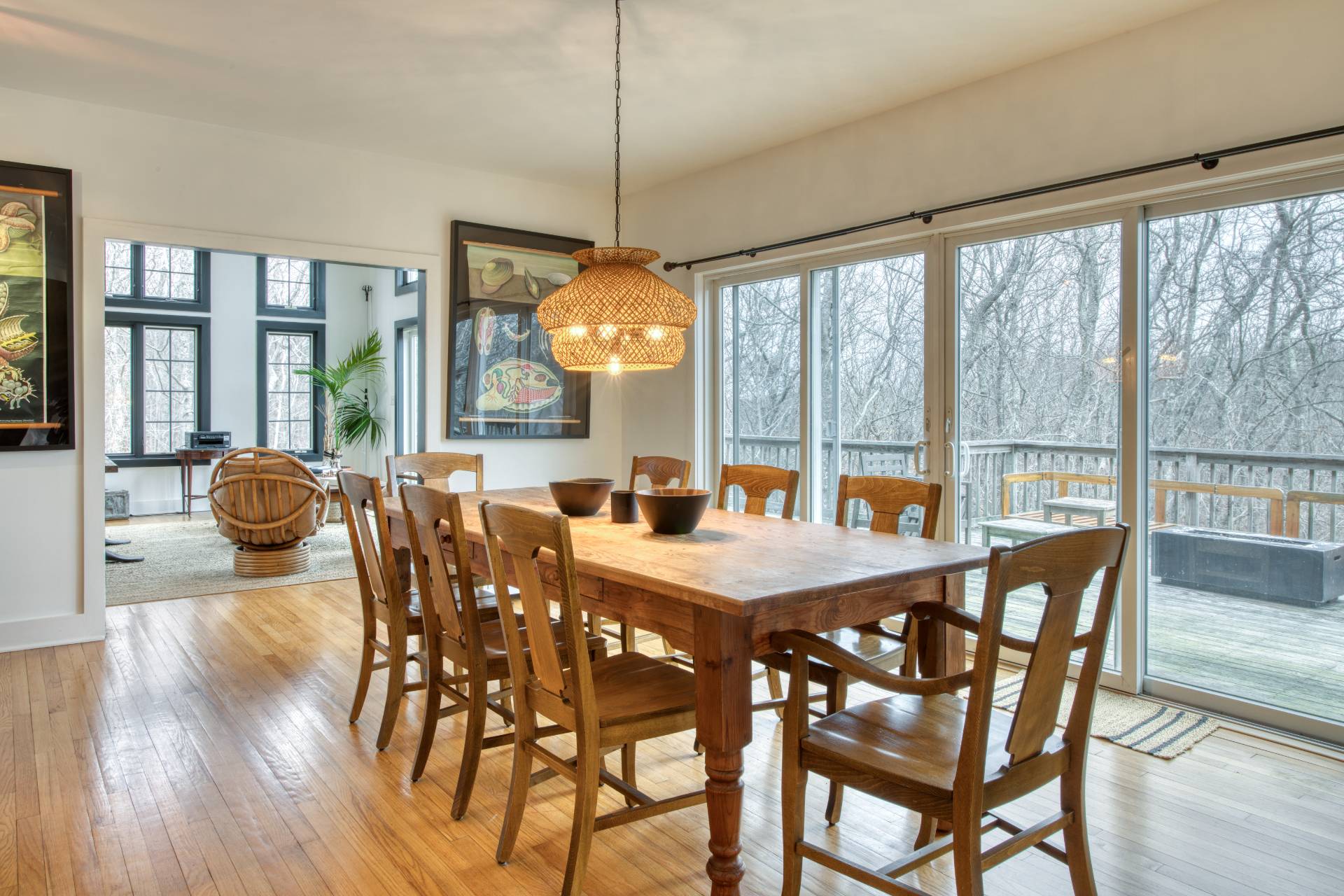 25 Laurel Hill Lane Amagansett, NY 11930 - Photo 5 of 13 a view of a dining room with furniture large windows and wooden floor