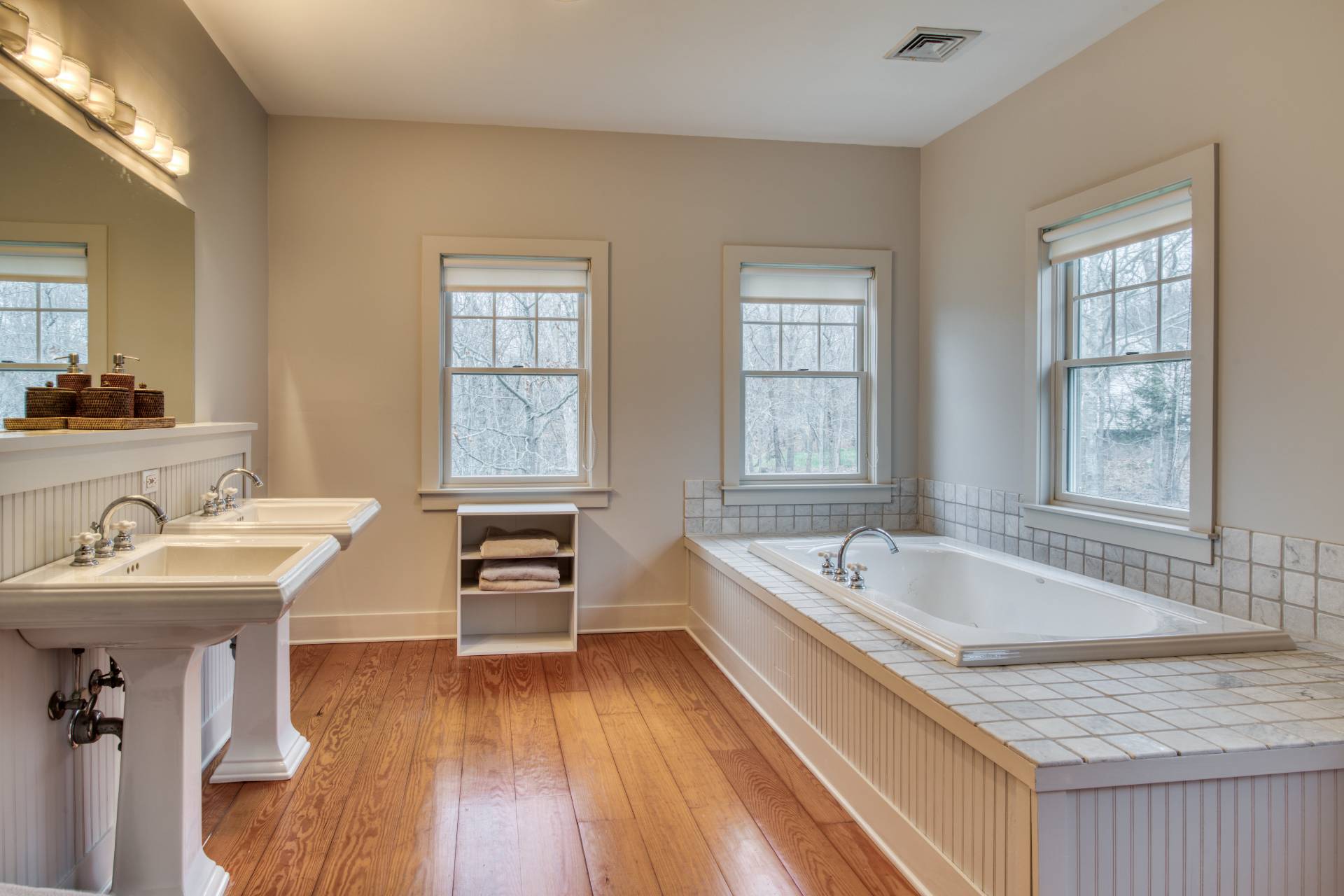 25 Laurel Hill Lane Amagansett, NY 11930 - Photo 7 of 13 a spacious bathroom with sink granite tub and a window