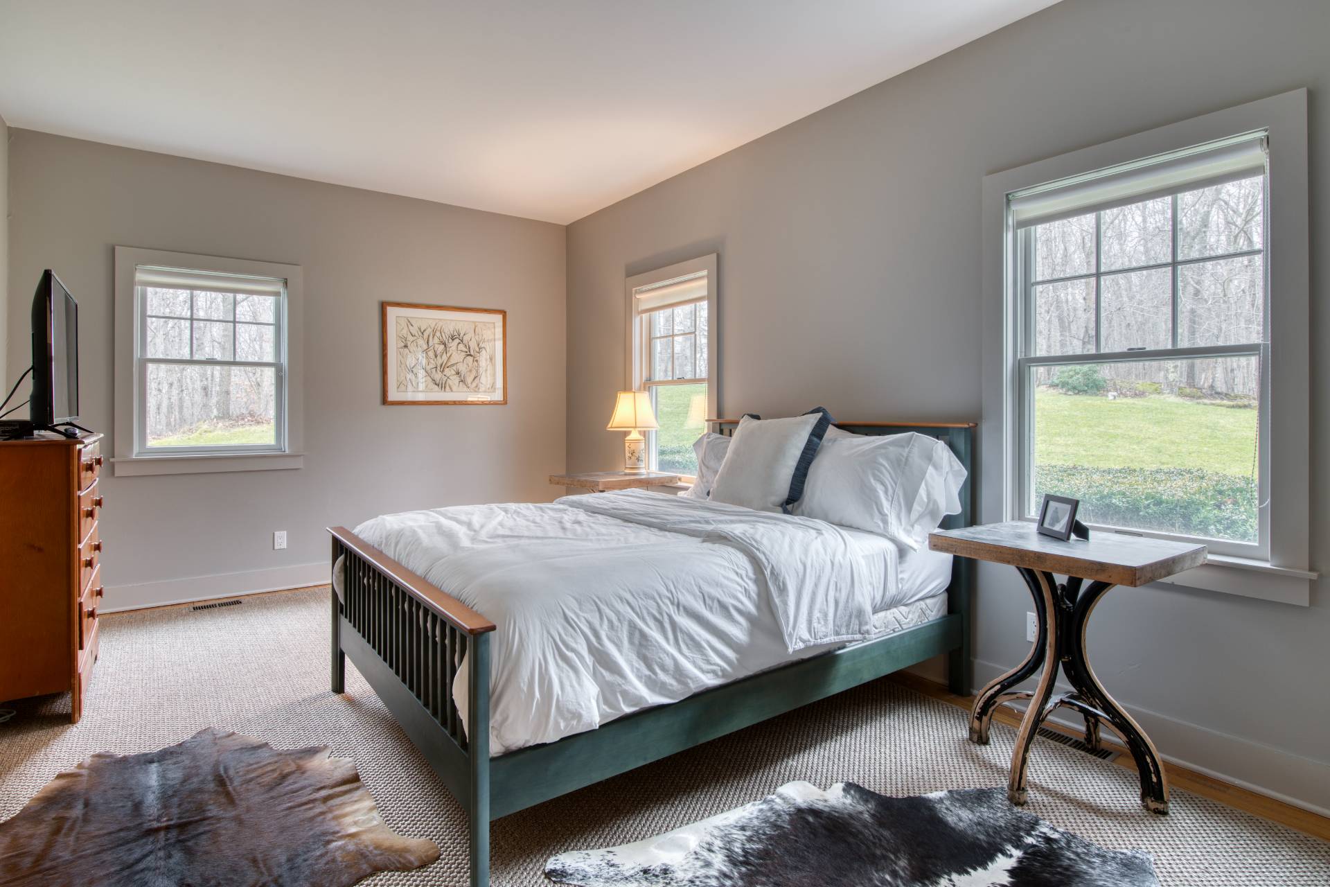 25 Laurel Hill Lane Amagansett, NY 11930 - Photo 9 of 13 a bedroom with a bed window and chair