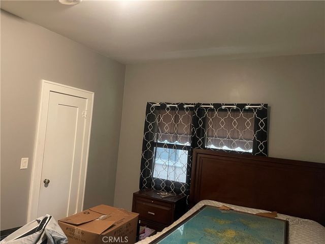 a room with furniture and a window