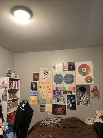 a view of workspace with furniture and book shelf