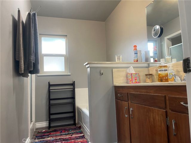 a room with cabinets and window
