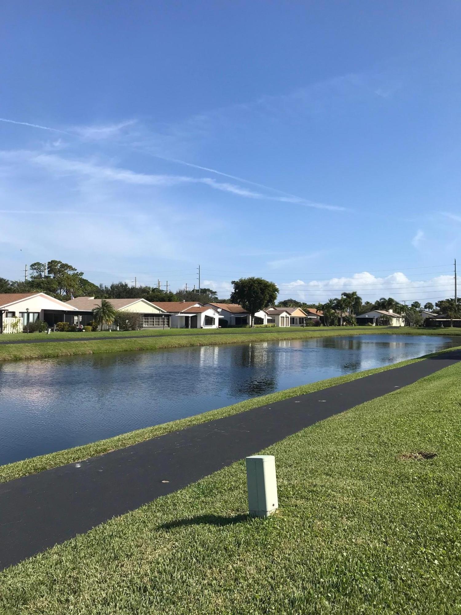 5173 Minto Road Boynton Beach, FL 33472 - Photo 15 of 19 a view of a lake with houses