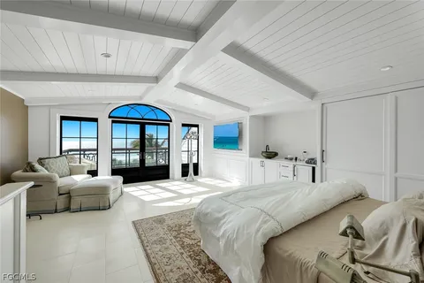 a view of a porch with a floor to ceiling window