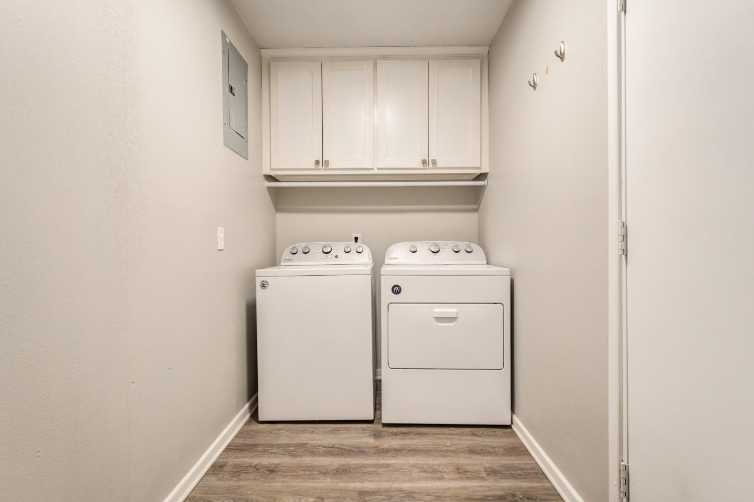 4409 49th Street Lubbock, TX 79414 - Photo 23 of 49 a utility room with dryer and washer