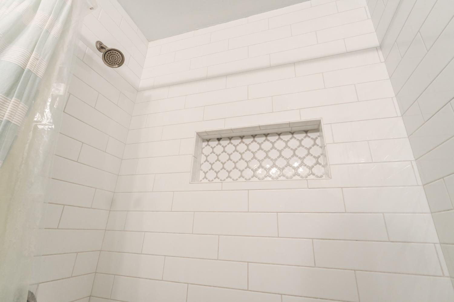 4409 49th Street Lubbock, TX 79414 - Photo 28 of 49 a bathroom with a shower