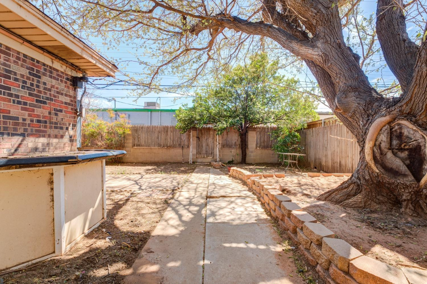 4409 49th Street Lubbock, TX 79414 - Photo 40 of 49 a view of a backyard of the house