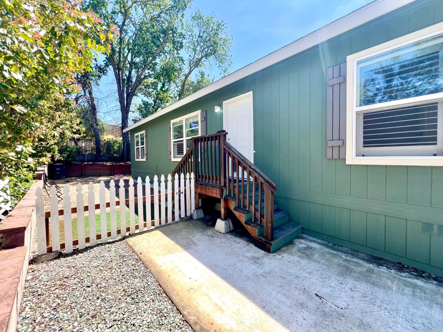 53 Saxton Circle, Unit 53 Citrus Heights, CA 95621 - Photo 2 of 19 a view of a small yard with wooden fence