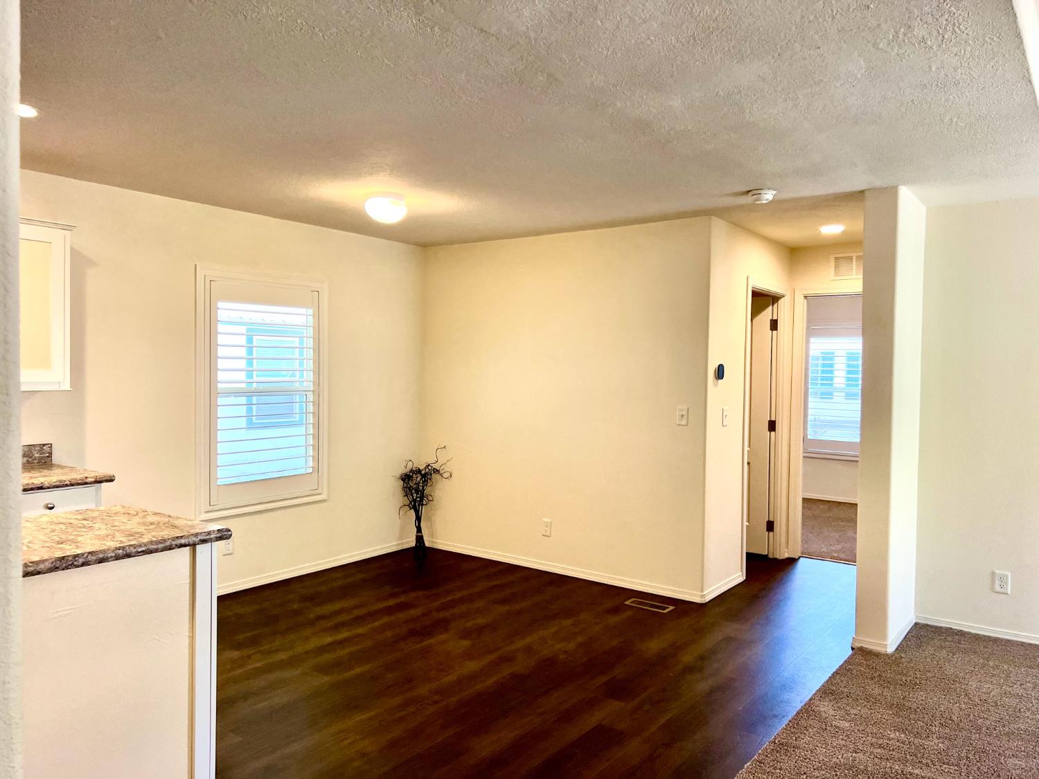 53 Saxton Circle, Unit 53 Citrus Heights, CA 95621 - Photo 10 of 19 a view of empty room with wooden floor and fan