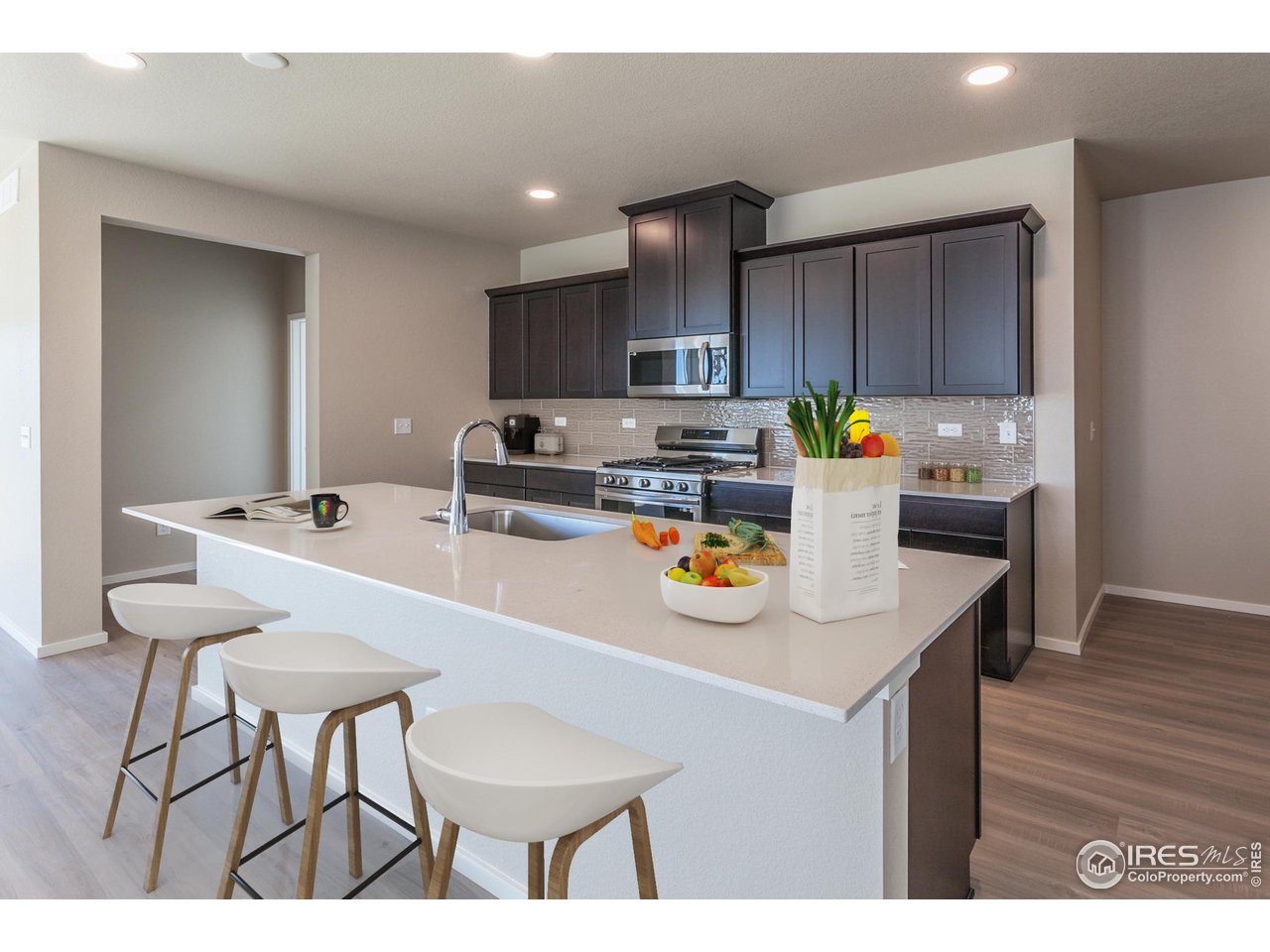 6630 4th St Road Greeley, CO 80634 - Photo 8 of 30 Kitchen with large center island