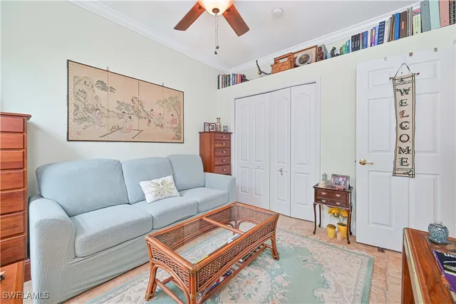 a living room with furniture and a white table