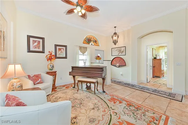 a living room with furniture and a table