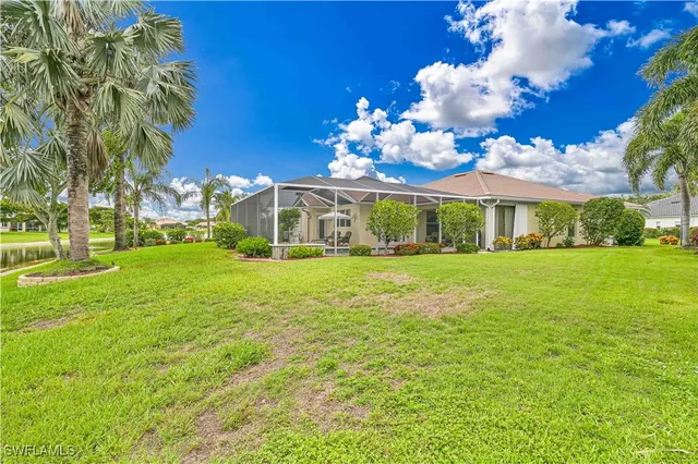 a view of a house with a big yard