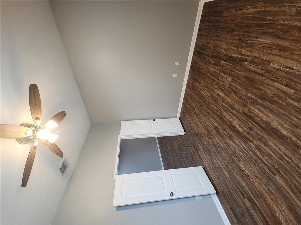 4015 Dunlap Loop College Station, TX 77845 - Photo 13 of 40 wooden floor in an empty room with a window