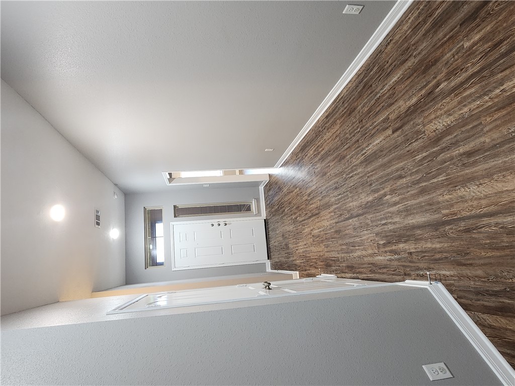 4015 Dunlap Loop College Station, TX 77845 - Photo 2 of 40 a view of an empty room with wooden floor and closet