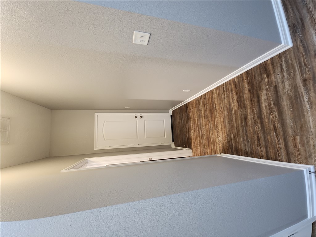 4015 Dunlap Loop College Station, TX 77845 - Photo 27 of 40 a view of a hallway with wooden floor