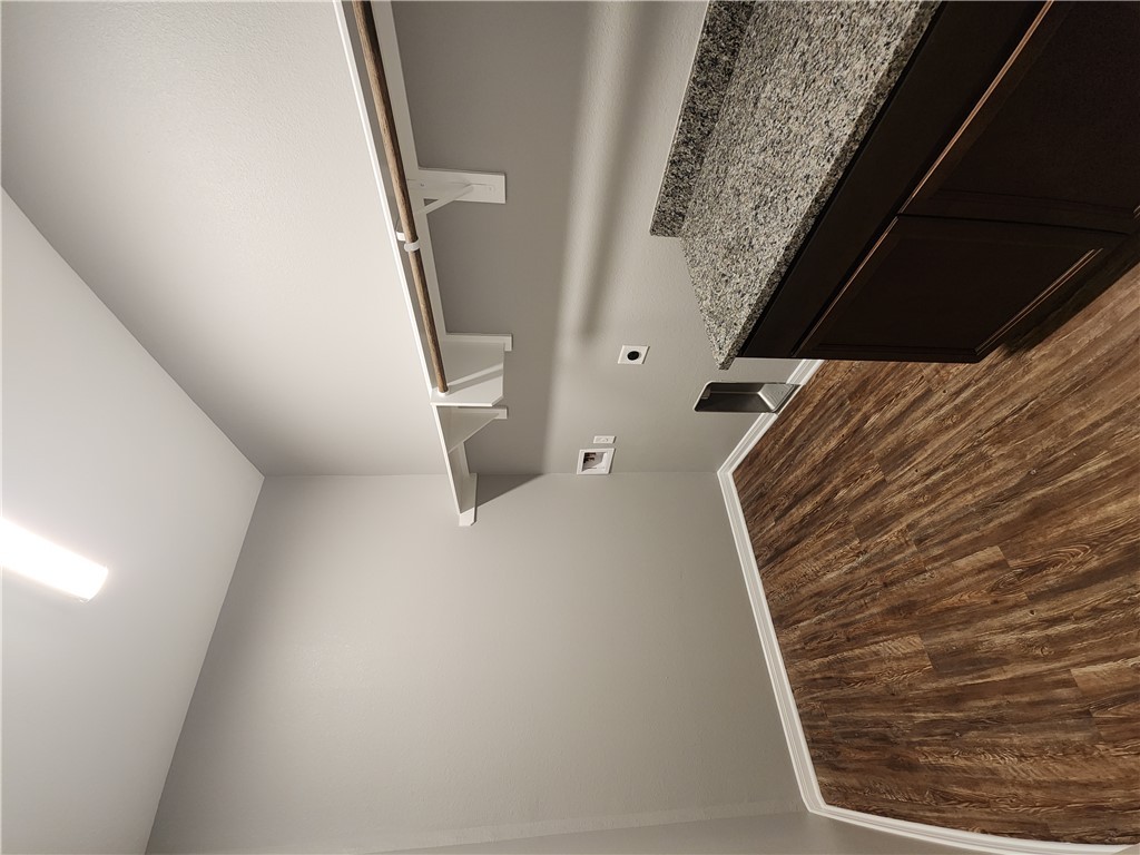 4015 Dunlap Loop College Station, TX 77845 - Photo 28 of 40 a kitchen with a sink and cabinets