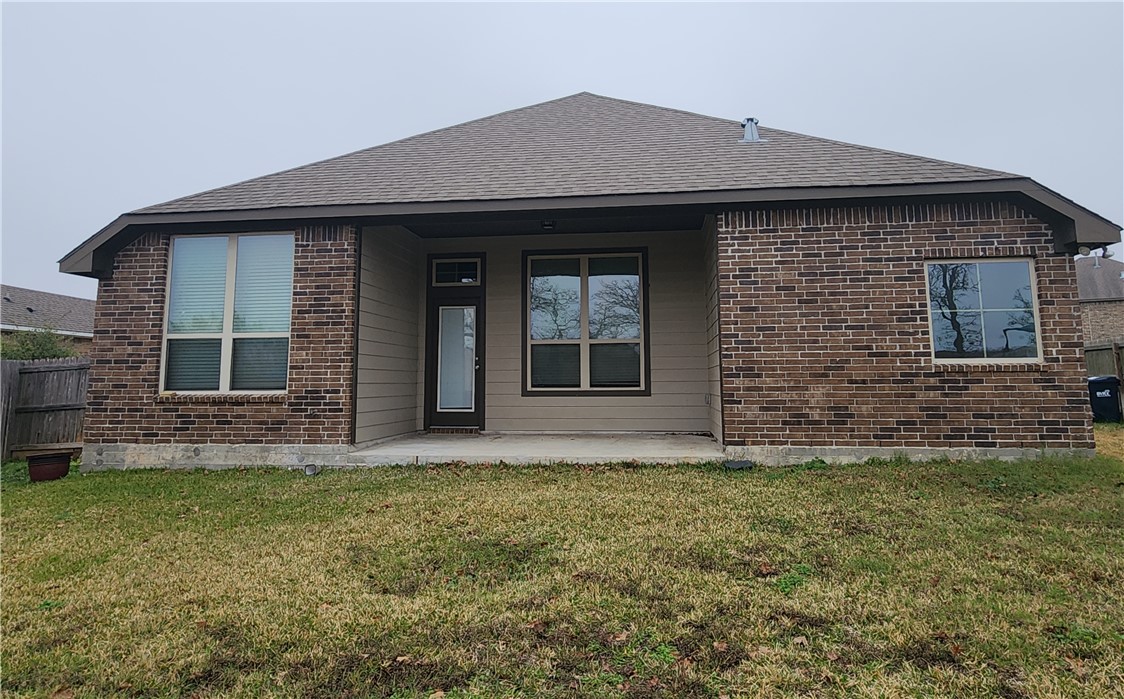 4015 Dunlap Loop College Station, TX 77845 - Photo 32 of 40 a front view of a house with a yard
