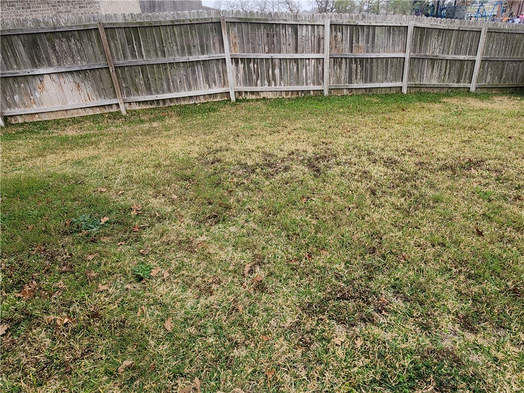 4015 Dunlap Loop College Station, TX 77845 - Photo 36 of 40 a view of a backyard with a small deck