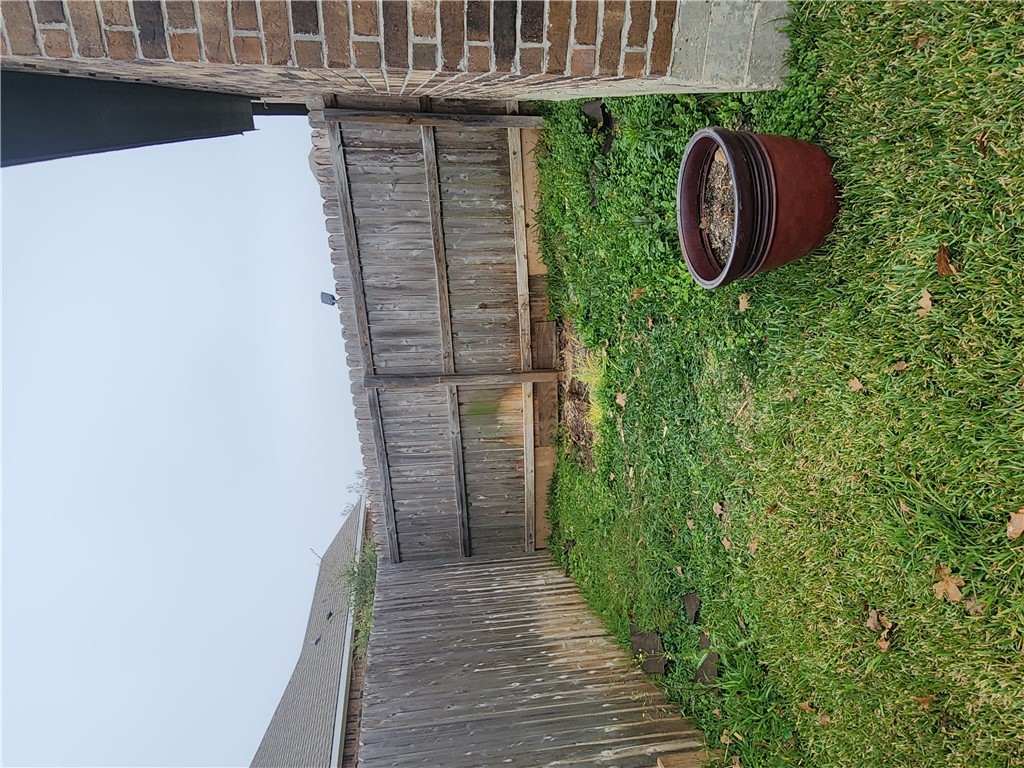 4015 Dunlap Loop College Station, TX 77845 - Photo 37 of 40 a view of a backyard with a plants and a fountain