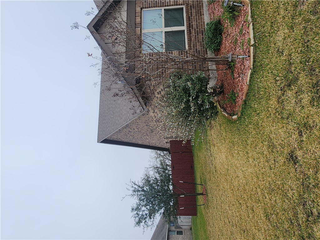 4015 Dunlap Loop College Station, TX 77845 - Photo 39 of 40 a view of a house with a yard
